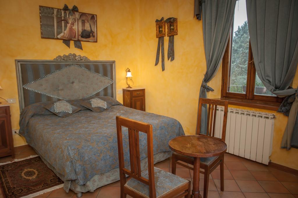 Апартаменти Residenza Il Palazzo Кастільйоне-дель-Лаго Номер фото