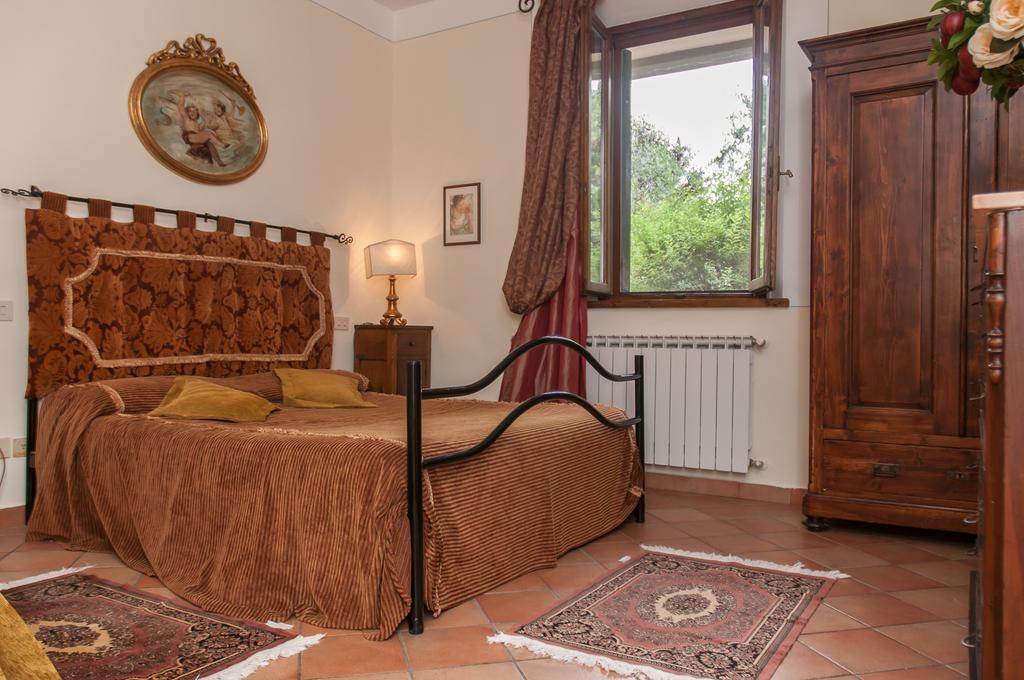 Апартаменти Residenza Il Palazzo Кастільйоне-дель-Лаго Номер фото