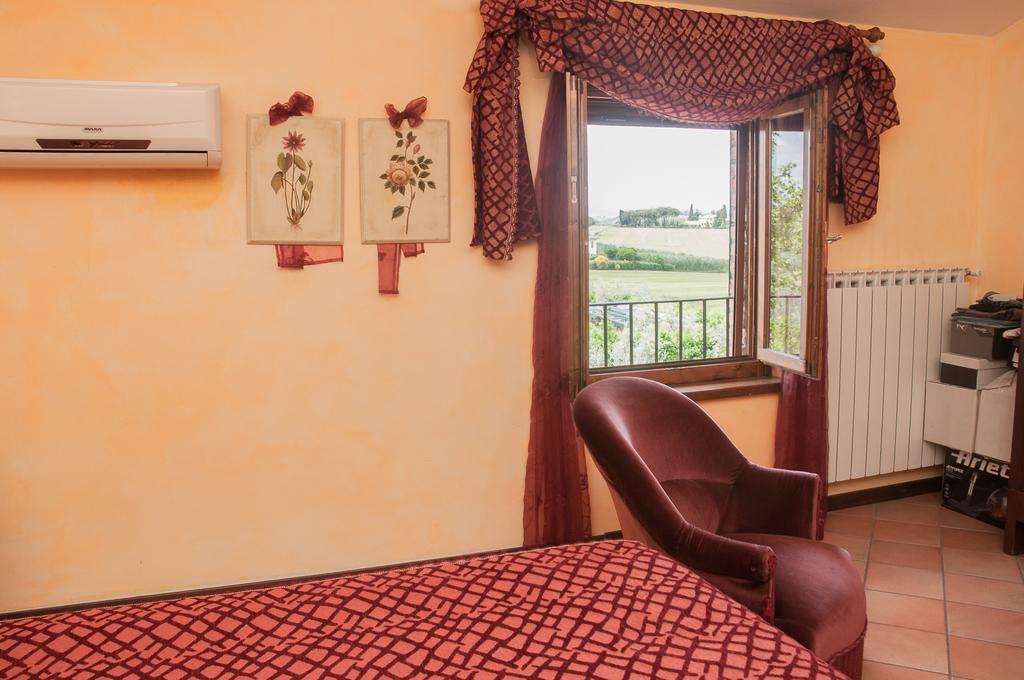 Апартаменти Residenza Il Palazzo Кастільйоне-дель-Лаго Номер фото