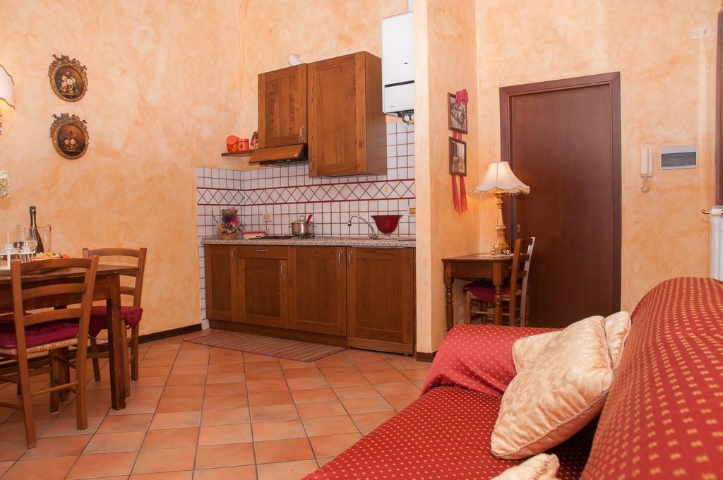 Апартаменти Residenza Il Palazzo Кастільйоне-дель-Лаго Номер фото